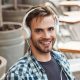 smiling-young-man-wearing-headphones-e1684487064572